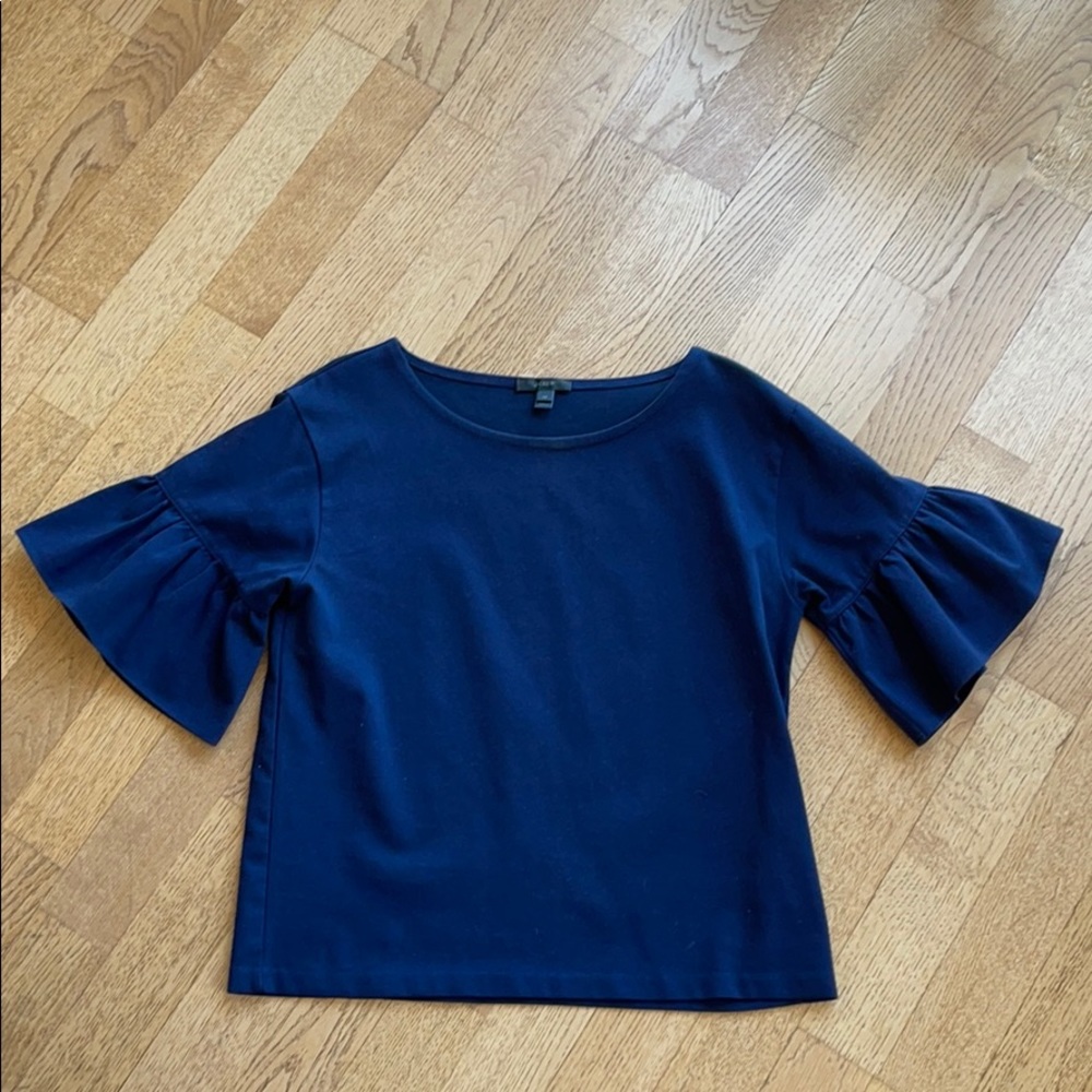 JCrew // structured navy top with peplum sleeves